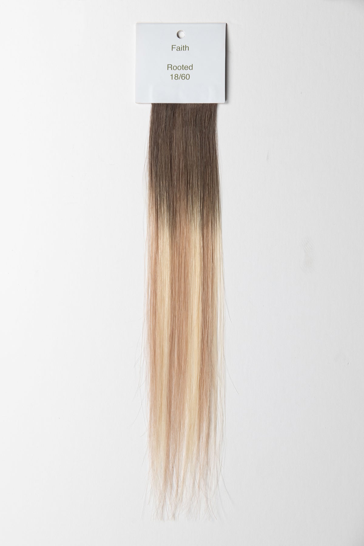Faith rooted bright blonde hair extension color swatch